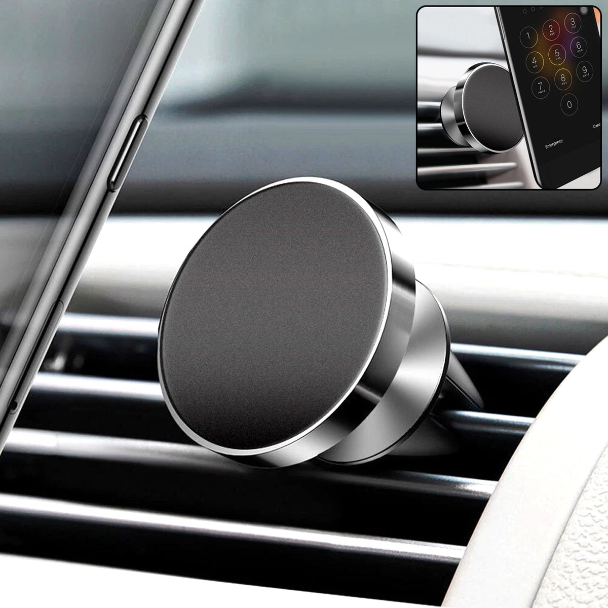 A close-up of a black and silver magnetic car mount on an air vent, with a phone visible in the background.