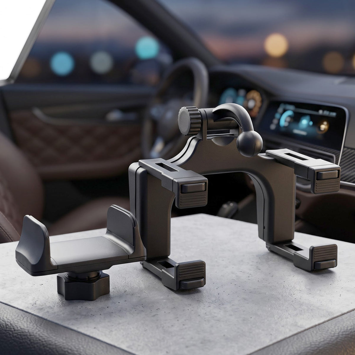 A black car phone mount with a ball joint and adjustable clips, sitting on a car's dashboard.