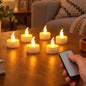 Six white LED flameless candles glowing on a wooden table with a hand holding a remote control.