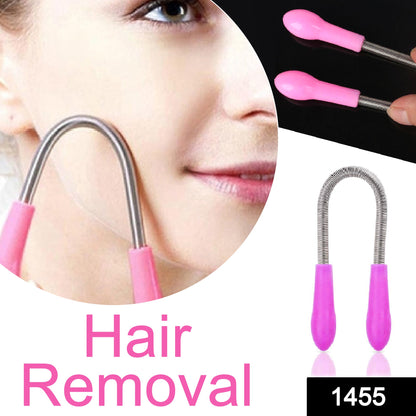A person's face with the pink and silver facial hair remover spring tool near their cheek, with text overlay 'Hair Removal'.