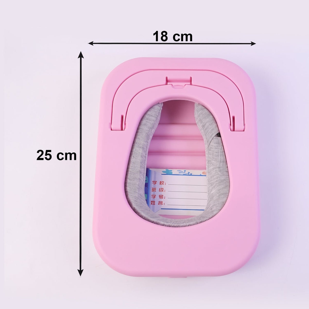 The pink desktop nap pillow is shown folded flat with dimensions of 18 cm by 25 cm indicated by arrows.