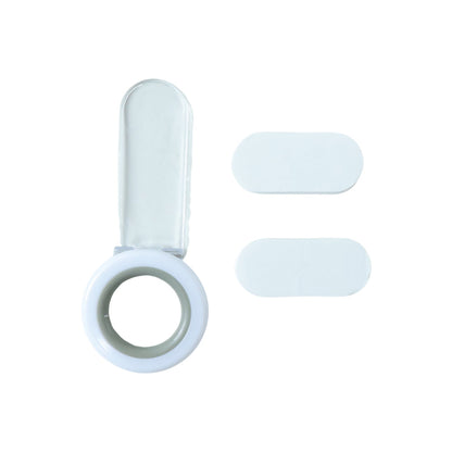 A white and gray toilet seat lifter with a clear handle and two white oval adhesive pads on a white background.