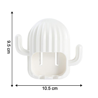 White cactus toothbrush holder with dimensions of 9.5 cm height and 10.5 cm width on a white background.