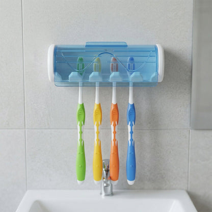 White and blue wall-mounted toothbrush holder with four colorful toothbrushes above a bathroom sink.