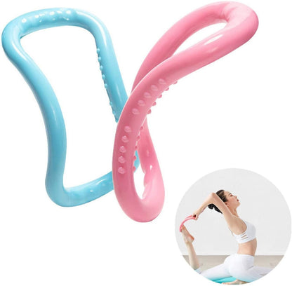 A light blue and a pink pilates ring with bumps, with a small inset of a woman stretching.