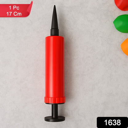 A red and black manual balloon pump stands upright against a light gray background, with a red label in the corner.