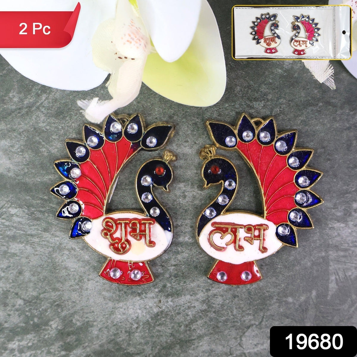Two peacock-shaped Shubh Labh wall hangings with red, blue, and white enamel, with a small inset showing the product