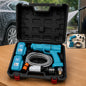 Open black carrying case revealing a teal pressure washer, two batteries, hose, and attachments on a wooden surface.