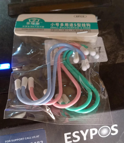A clear plastic package containing six colorful plastic coated S hooks with a label in English and Chinese.