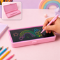 Pink LCD writing tablet pencil case with a rainbow and flower drawing, a pink stylus in a hand, and a close-up of the open