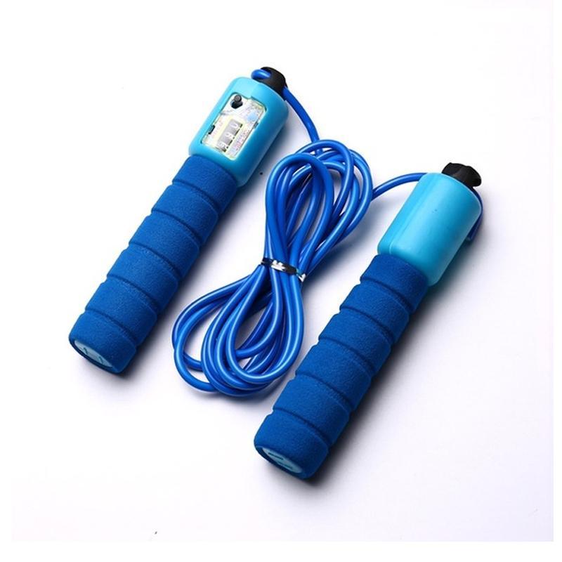 A blue electronic counting skipping rope with foam handles and a digital display is positioned on a plain white background.