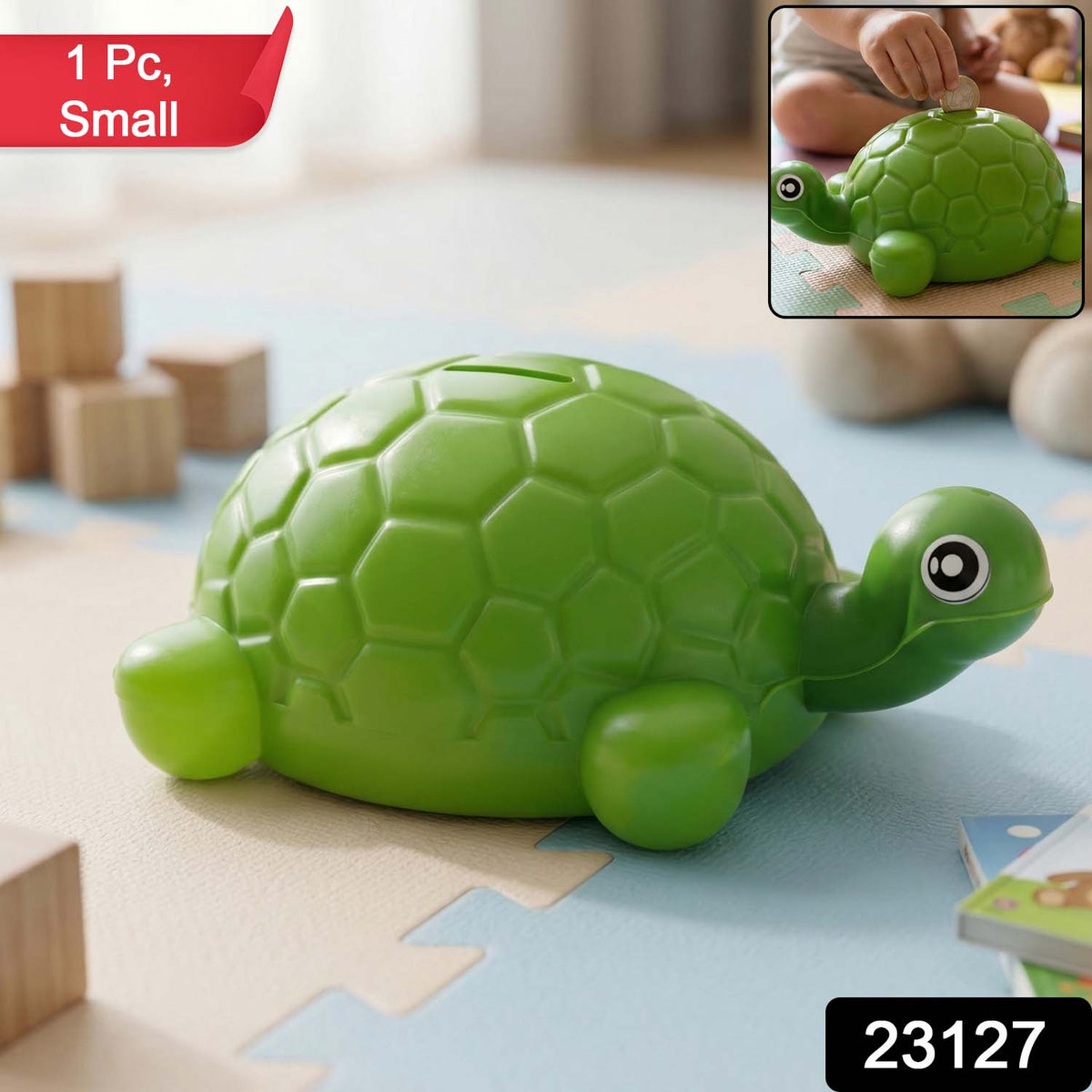 A green plastic turtle money bank on a playmat, with a red banner