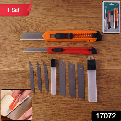 Two utility knives, one orange and one red, with extra blades and storage cases, on a wooden surface.