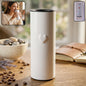 Stainless steel travel tumbler with LED display showing temperature